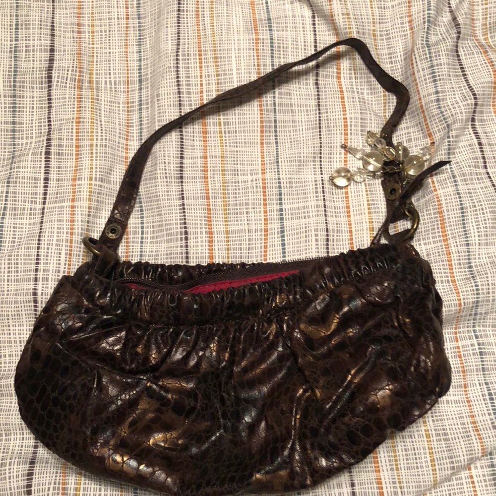 Brown snake skin clutch